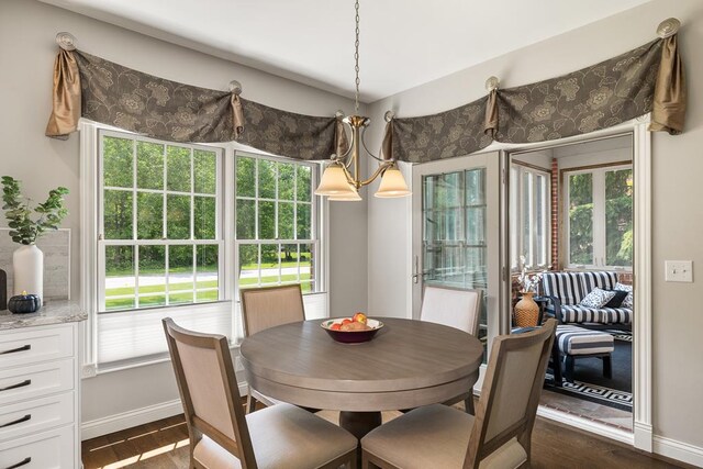 2313 Woodland Park Dr, Ontario, OH 44903 - dining room featuring dark wood-style floors and plenty of natural light
