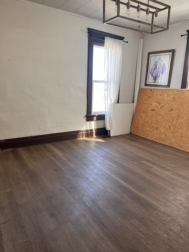 empty room with wood finished floors