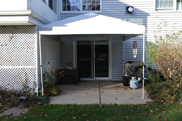 rear view of house featuring a patio