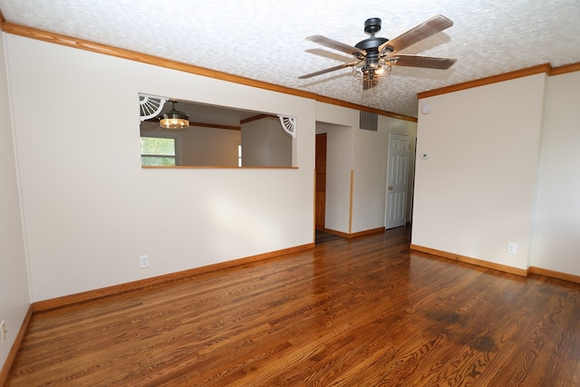 empty room with dark hardwood / wood-style flooring, a textured ceiling, ceiling fan, and crown molding