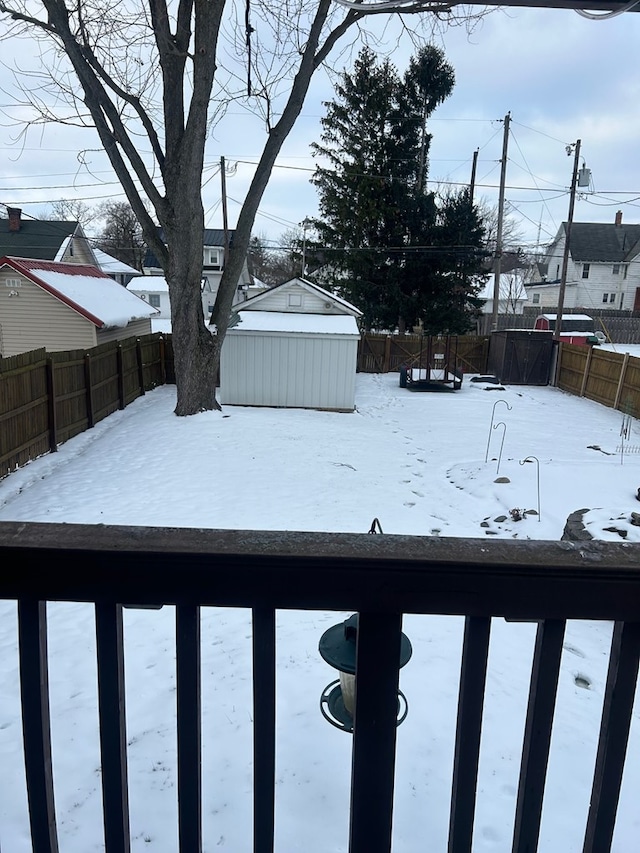 view of yard covered in snow