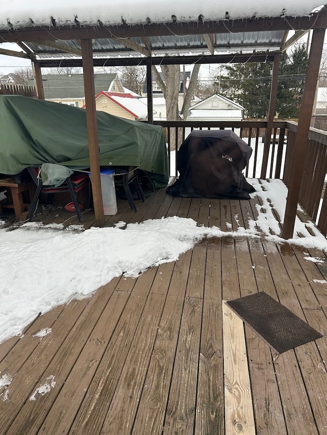 view of snow covered deck