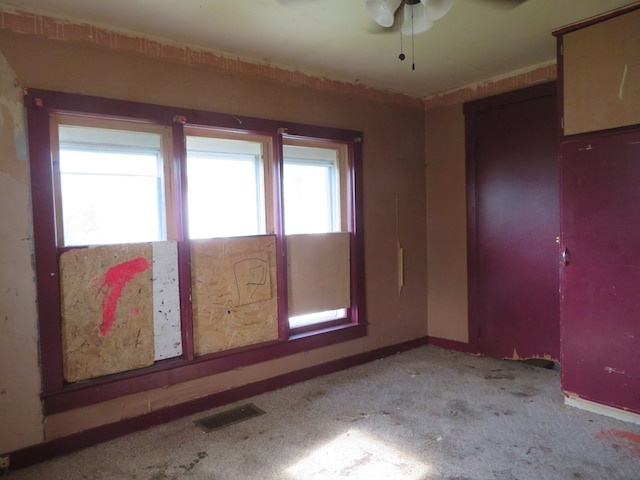 875 E Walnut St, Galion, OH 44833 - empty room with light colored carpet, baseboards, and ceiling fan