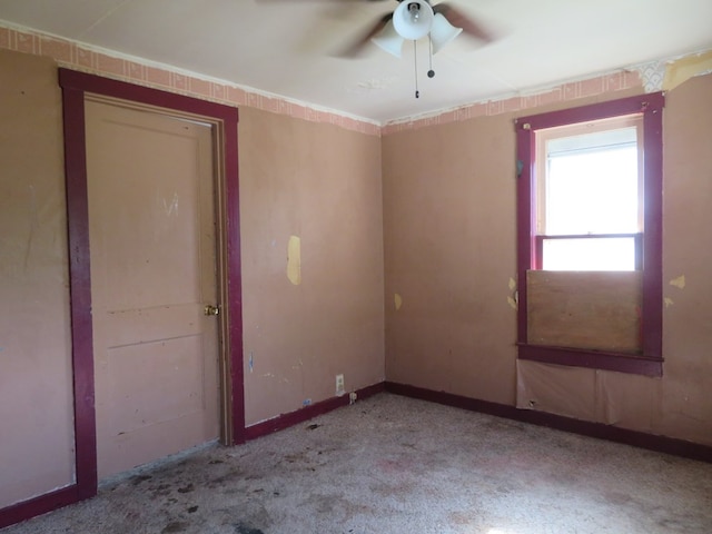 875 E Walnut St, Galion, OH 44833 - carpeted empty room featuring a ceiling fan and baseboards