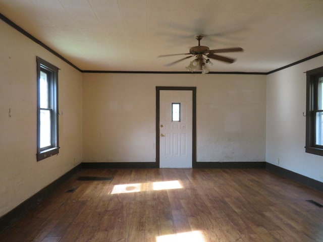 875 E Walnut St, Galion, OH 44833 - unfurnished room with ceiling fan, hardwood / wood-style flooring, crown molding, and baseboards