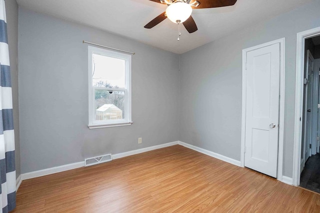 interior space with ceiling fan and light hardwood / wood-style flooring