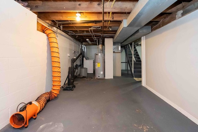 basement with washer / dryer and water heater