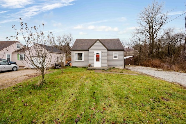 view of front of home with a front lawn