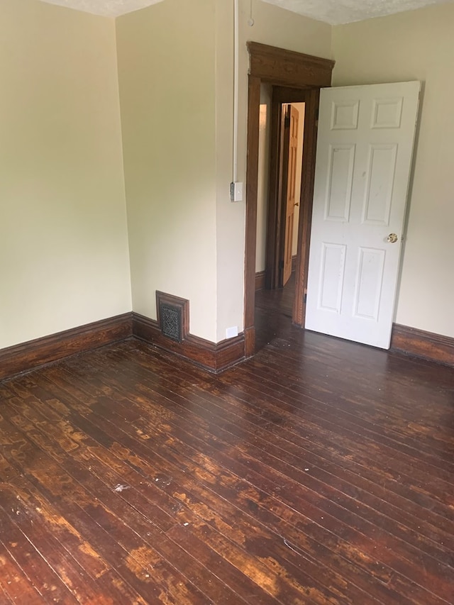 406 Sherman Pl, Mansfield, OH 44903 - spare room featuring hardwood / wood-style floors and baseboards
