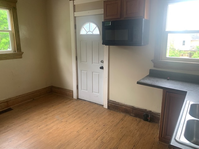406 Sherman Pl, Mansfield, OH 44903 - foyer entrance featuring light wood finished floors