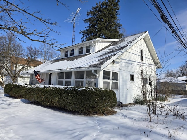 view of snow covered property