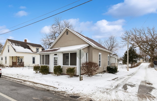 view of snow covered property