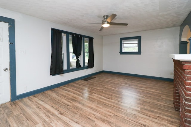 460 W Dickson, Mansfield, OH 44903 - empty room featuring ceiling fan, wood finished floors, and a textured ceiling