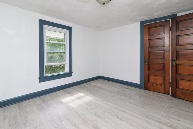 460 W Dickson, Mansfield, OH 44903 - spare room with light wood finished floors and baseboards