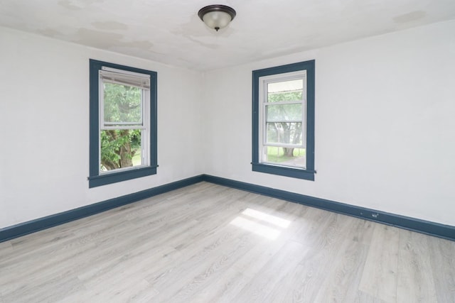 460 W Dickson, Mansfield, OH 44903 - empty room featuring healthy amount of natural light and light wood finished floors