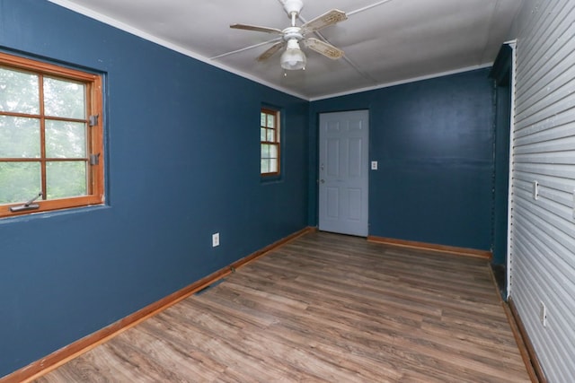 460 W Dickson, Mansfield, OH 44903 - unfurnished room with wood finished floors, a ceiling fan, and crown molding