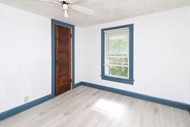 460 W Dickson, Mansfield, OH 44903 - empty room with light wood-type flooring and ceiling fan