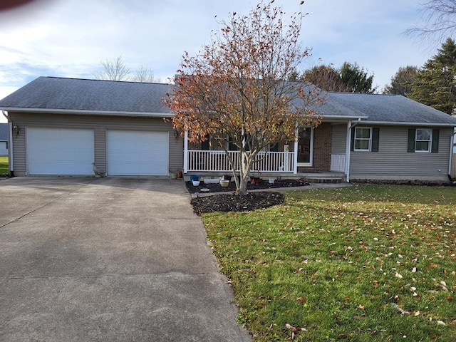 single story home featuring a front yard, a porch, and a garage