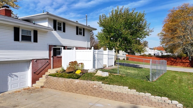 view of yard featuring a garage