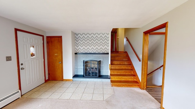 entrance foyer with a fireplace, light colored carpet, and a baseboard radiator