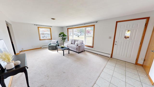 carpeted living room with a baseboard heating unit