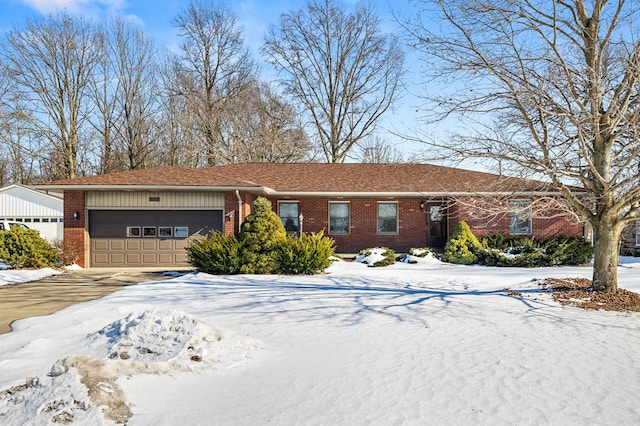 single story home featuring a garage