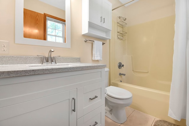 full bathroom with tile patterned flooring, shower / bath combo, vanity, and toilet