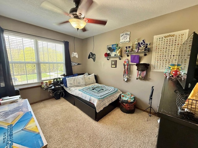 352 Valleybrook Cir, Howard, OH 43028 - carpeted bedroom with a textured ceiling, ceiling fan, and baseboards