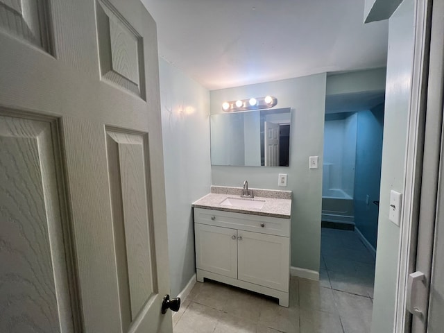 bathroom featuring tile patterned floors and vanity