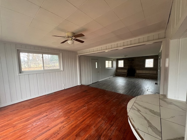 interior space featuring ceiling fan and hardwood / wood-style floors