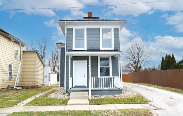 view of property with covered porch