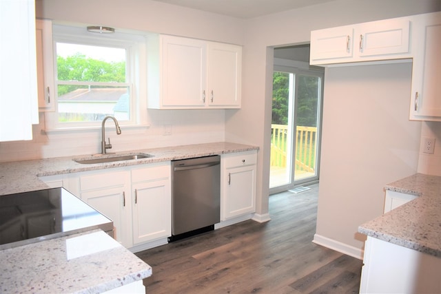 kitchen featuring white cabinetry, dishwasher, light stone countertops, and sink