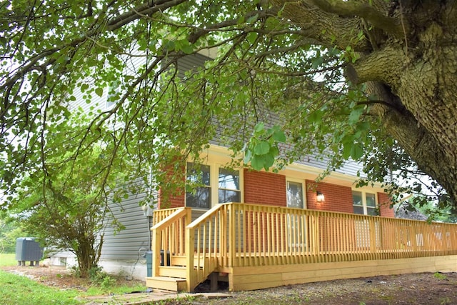 back of property with a deck