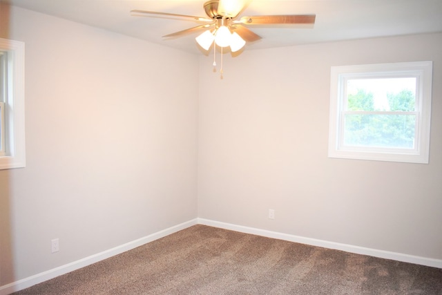 unfurnished room featuring carpet floors and ceiling fan