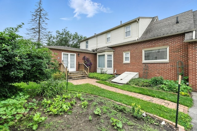 501 Overlook Rd, Mansfield, OH 44907 - back of house with brick siding, french doors, and roof with shingles