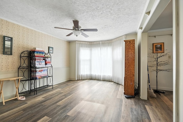 501 Overlook Rd, Mansfield, OH 44907 - bedroom featuring wood finished floors, crown molding, wallpapered walls, a textured ceiling, and ceiling fan