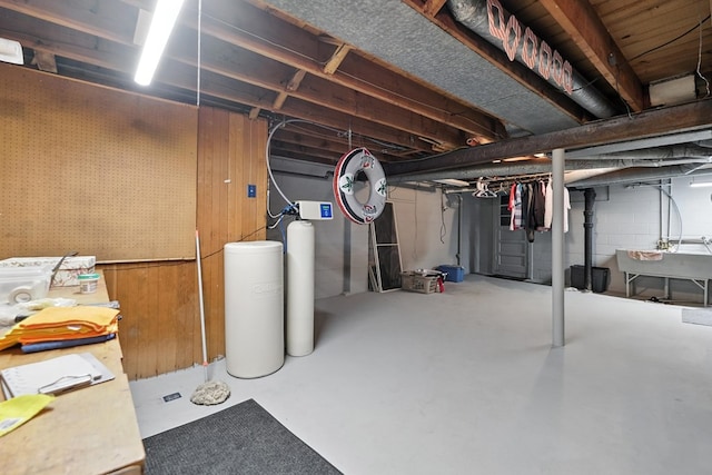 501 Overlook Rd, Mansfield, OH 44907 - unfinished basement featuring a water softener system and a sink