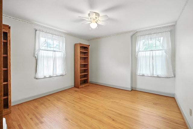 501 Overlook Rd, Mansfield, OH 44907 - unfurnished room featuring healthy amount of natural light, a ceiling fan, and wood finished floors