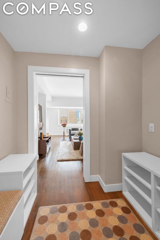 hallway featuring hardwood / wood-style floors