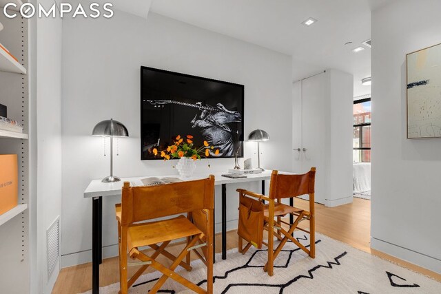 dining room featuring light hardwood / wood-style floors