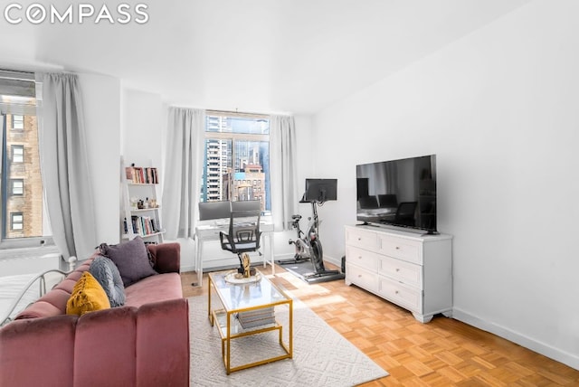 living room with light parquet floors