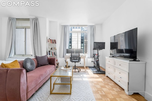 living room with light parquet floors