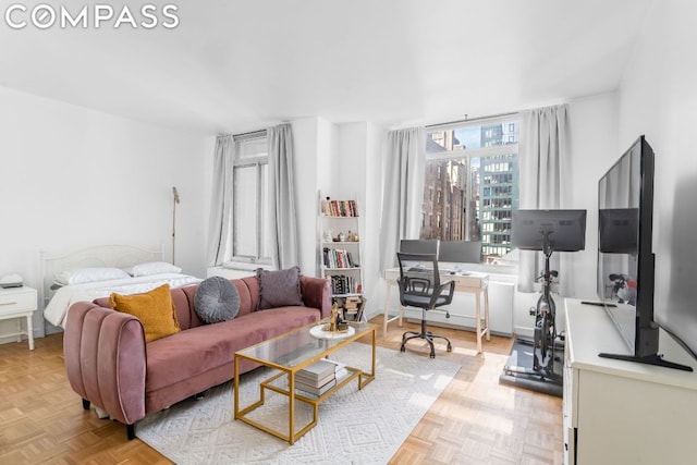 living room featuring light parquet flooring