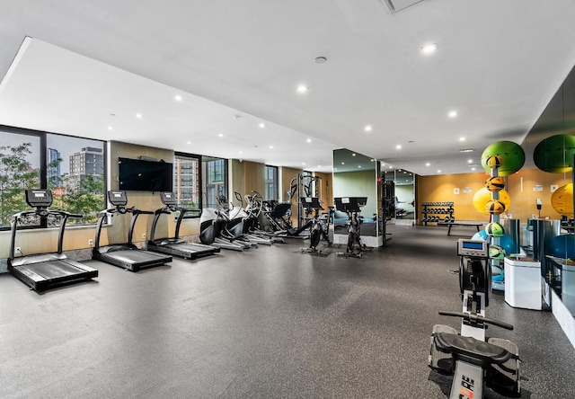 exercise room with recessed lighting