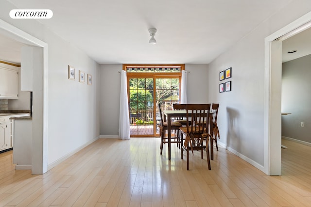 dining room with light wood-type flooring