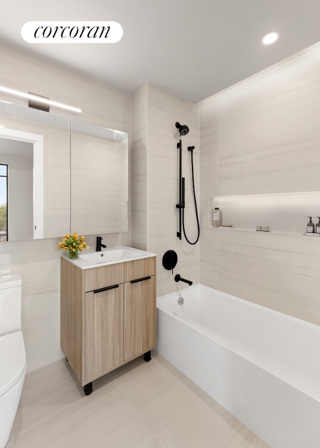 bathroom featuring washtub / shower combination, recessed lighting, vanity, and toilet