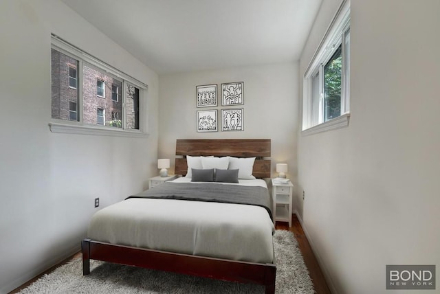 bedroom with wood-type flooring