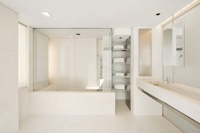 bathroom with vanity and tile patterned flooring