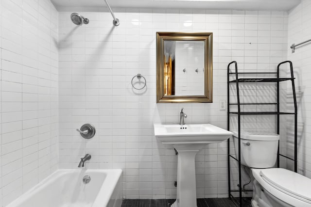 473 W 140th St, New York City, NY 10031 - bathroom featuring tile walls and shower / washtub combination