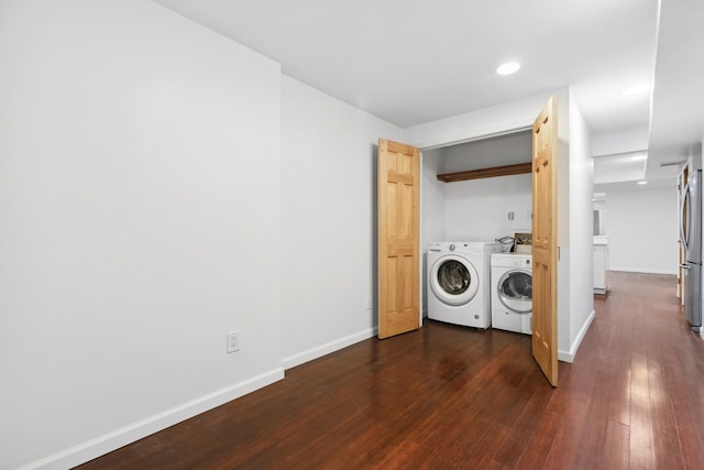 473 W 140th St, New York City, NY 10031 - laundry area with washing machine and clothes dryer, dark wood-style flooring, and recessed lighting